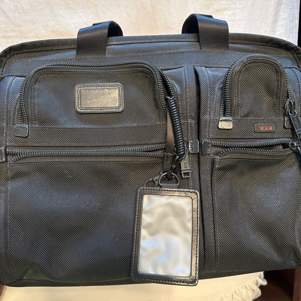 Tumi briefcase. Shoulder strap missing.